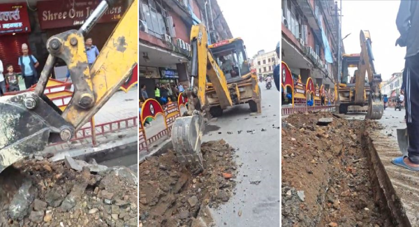 न्युरोड फुटपाथ विवाद : सहमति गर्न भन्दै काठमाडौं महानगरले रोक्यो काम, डोजर फिर्ता  